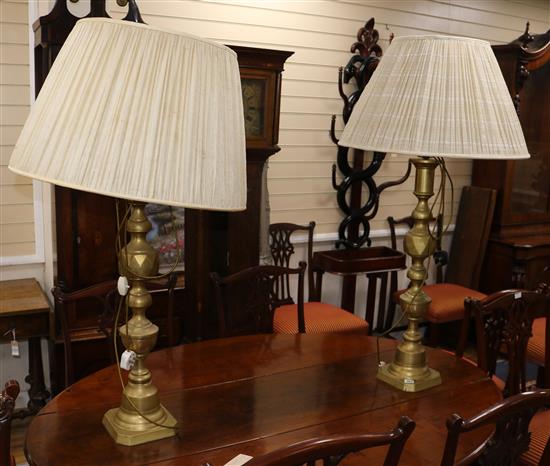 A pair of large brass lamps height 78cm excl. fittings